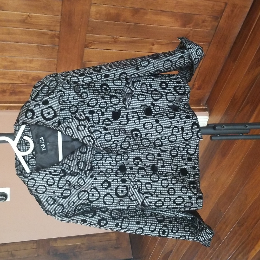 Fashionable Zsa Zsa jacket.